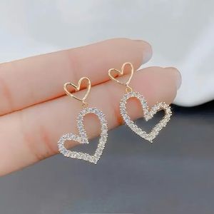Gold heart diamond earrings